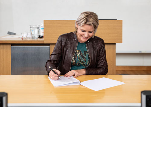 Rianne Letschert signing the Declaration of intent UN Convention higher education institutions