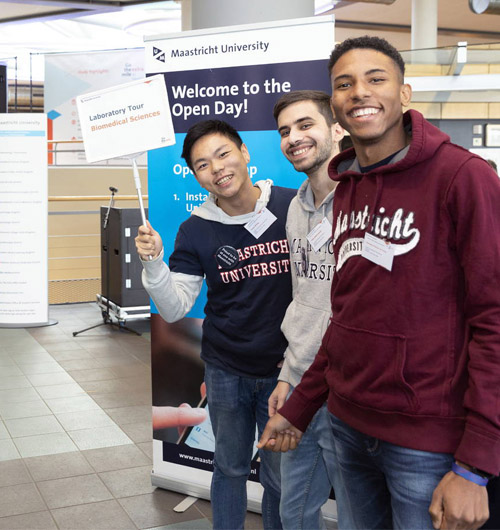 Students inviting you to a tour around their faculty