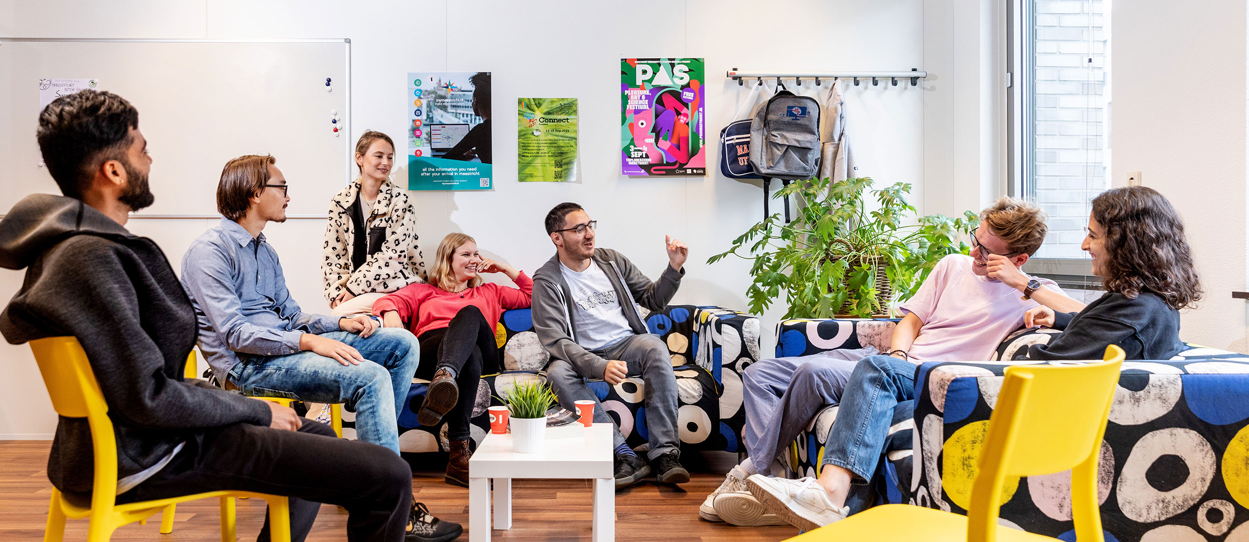 Group of students sitting in the common room