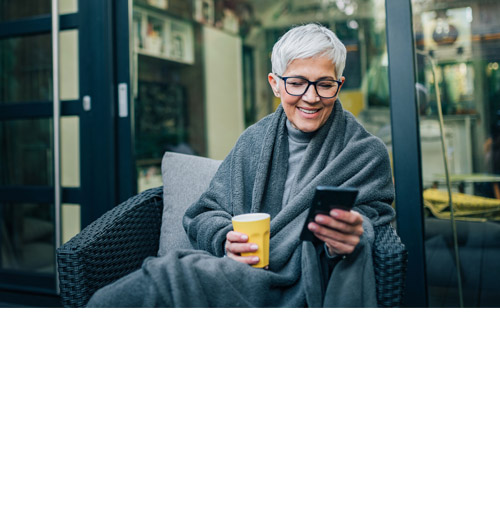 Lady is looking at her smartphone