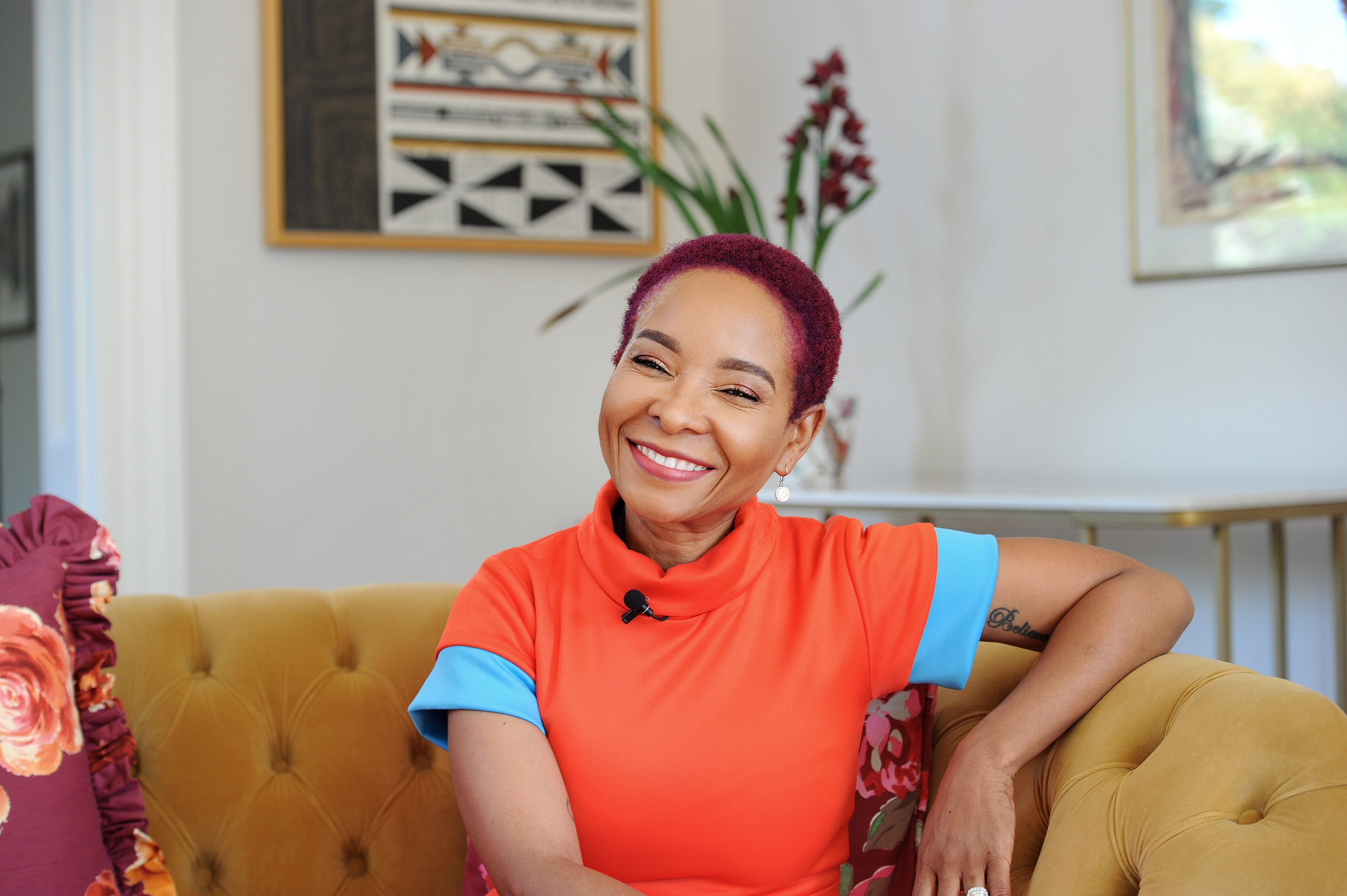 Prof. Mamokgethi Phakeng sitting on couch