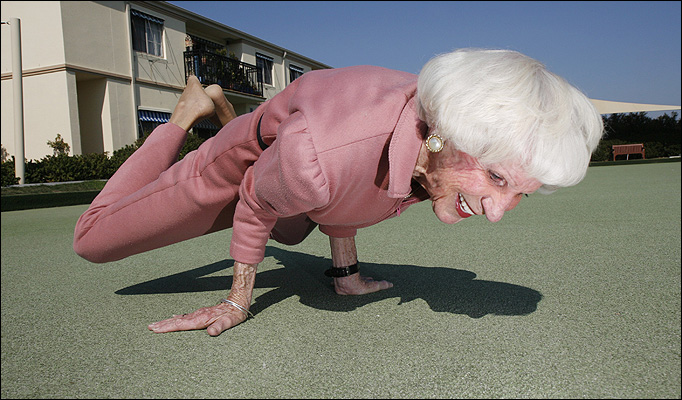 A picture of an old woman dancing.