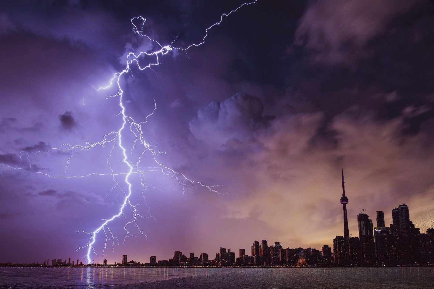 lightning strike next to a city