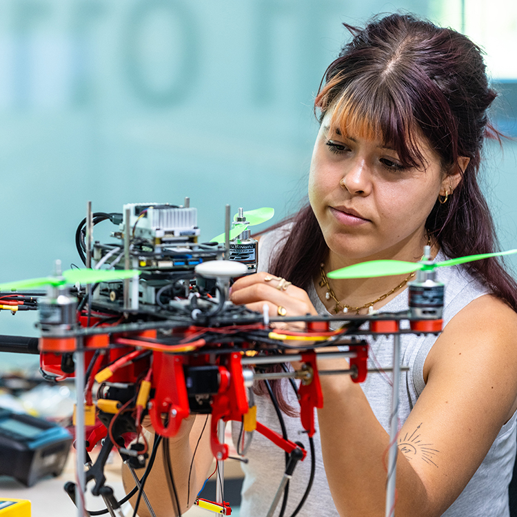 Girl working on drone