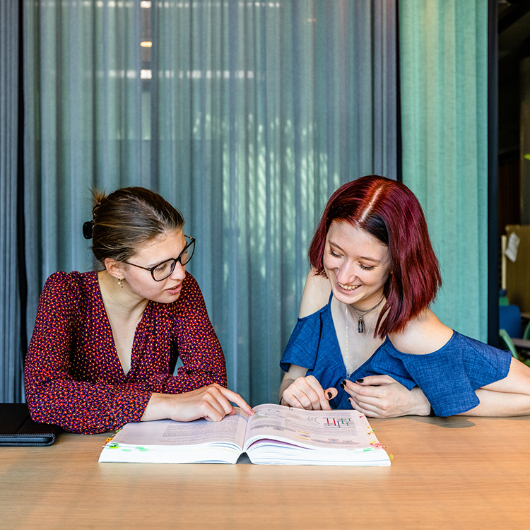 Two female students studying together