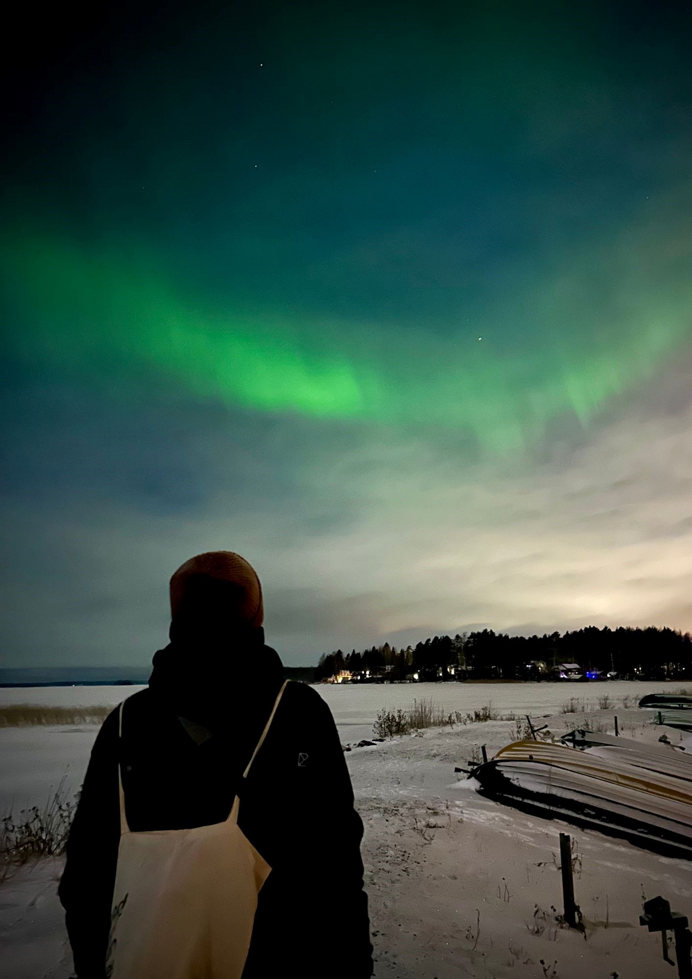 This image captures the essence that taking risks leads to the most rewarding experiences. When I chose the University of Eastern Finland (UEF), I expected to witness the northern lights frequently. Surprisingly, during my entire stay in Joensuu, I only saw them once, and I almost missed it. On the day this photo was taken, I wasn't feeling well. Overwhelmed by my coursework, I simply wanted a quiet night in bed. When my roommate mentioned an increased chance of seeing the northern lights, I hesitated but l