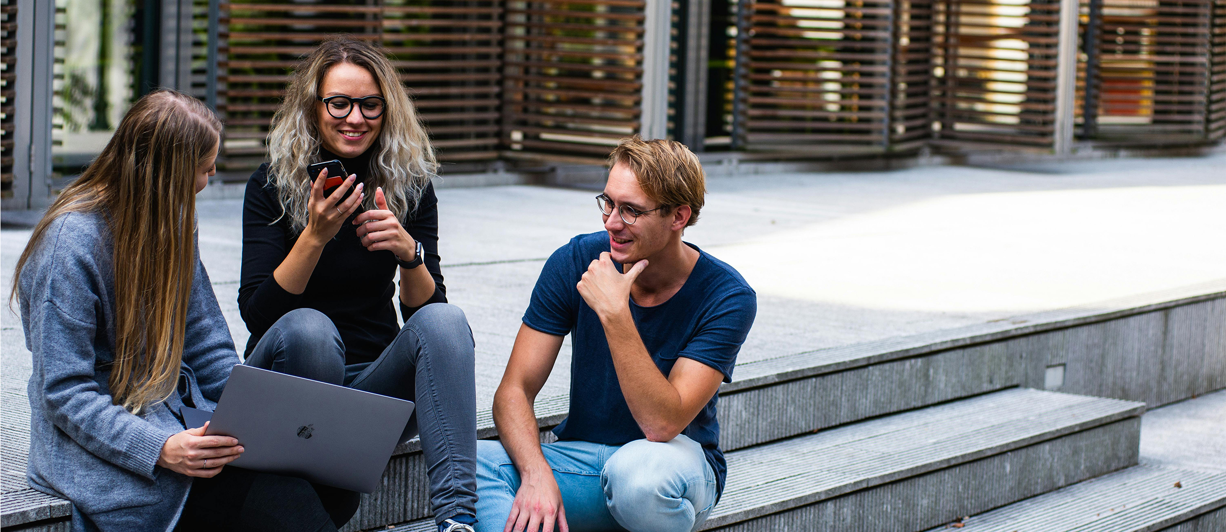 Students sitting on steps