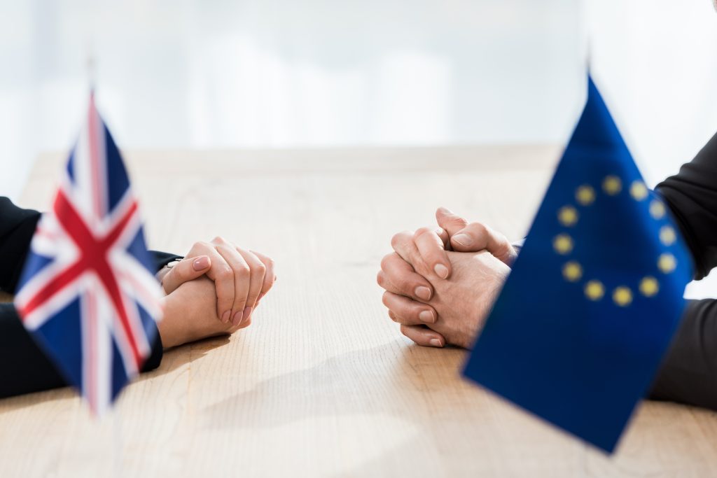Brexit negotations featuring UK and EU flags