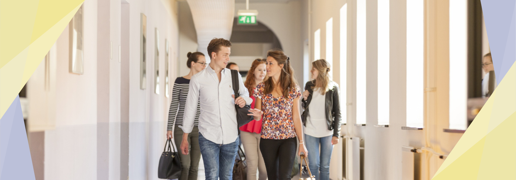 MCT - two persons talking in the hallway