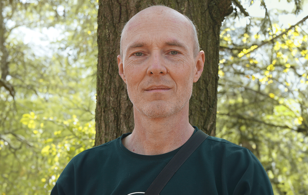 Man standing in the forest