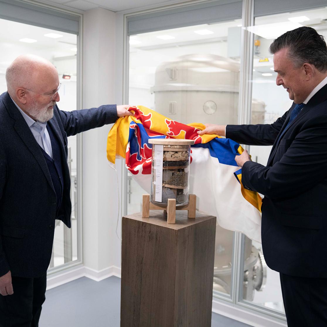 Politicians uncover jar of soil