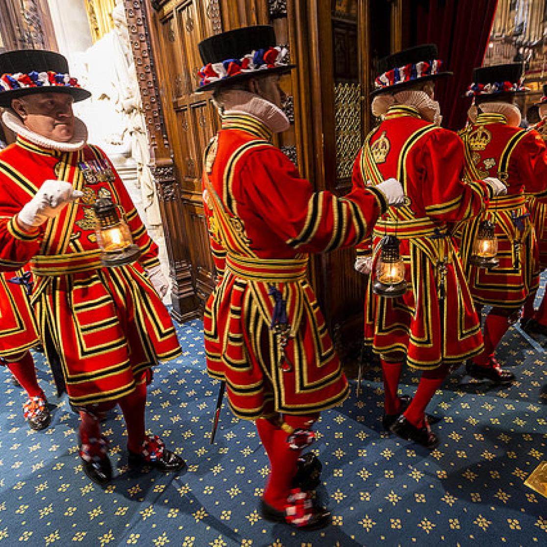 The Yeomen of the Guard proceed to the Lords chamber on their way to undertake the first ceremony of State Opening, the checking of the cellars.