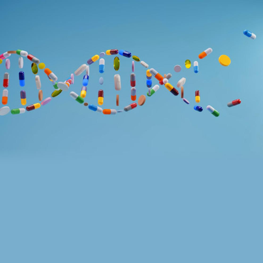 Pills layed out in the shape of a DNA spiral
