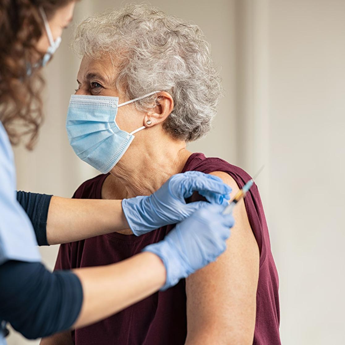 Elderly woman gets Covid vaccine