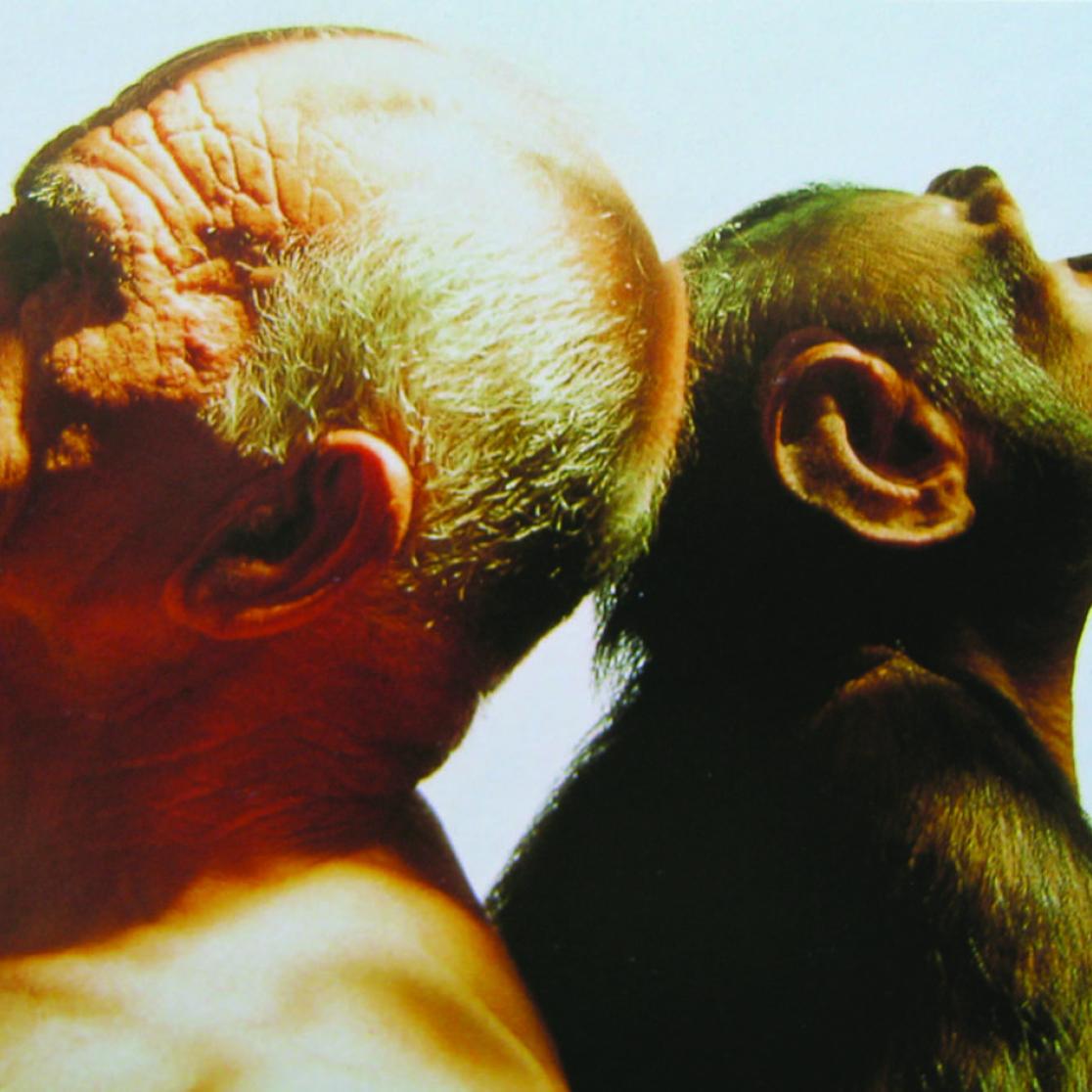 A picture of human and ape.