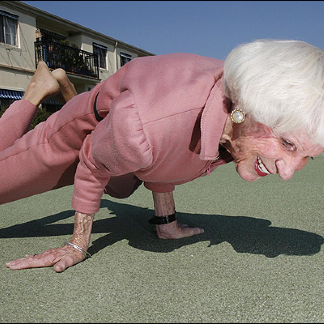 A picture of an old woman dancing.