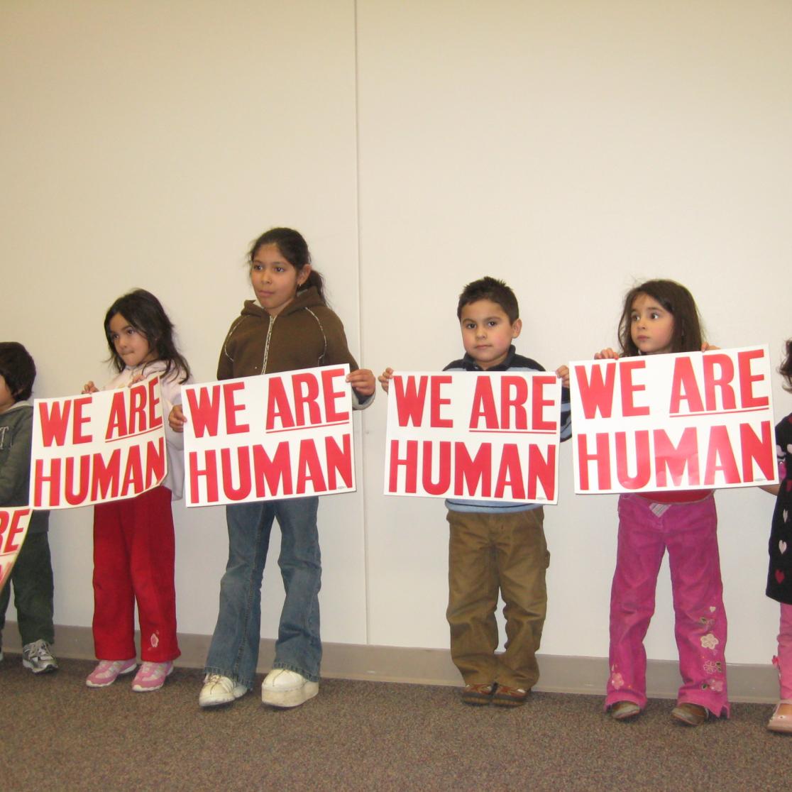 Human Rights: a picture of people holding protest signs