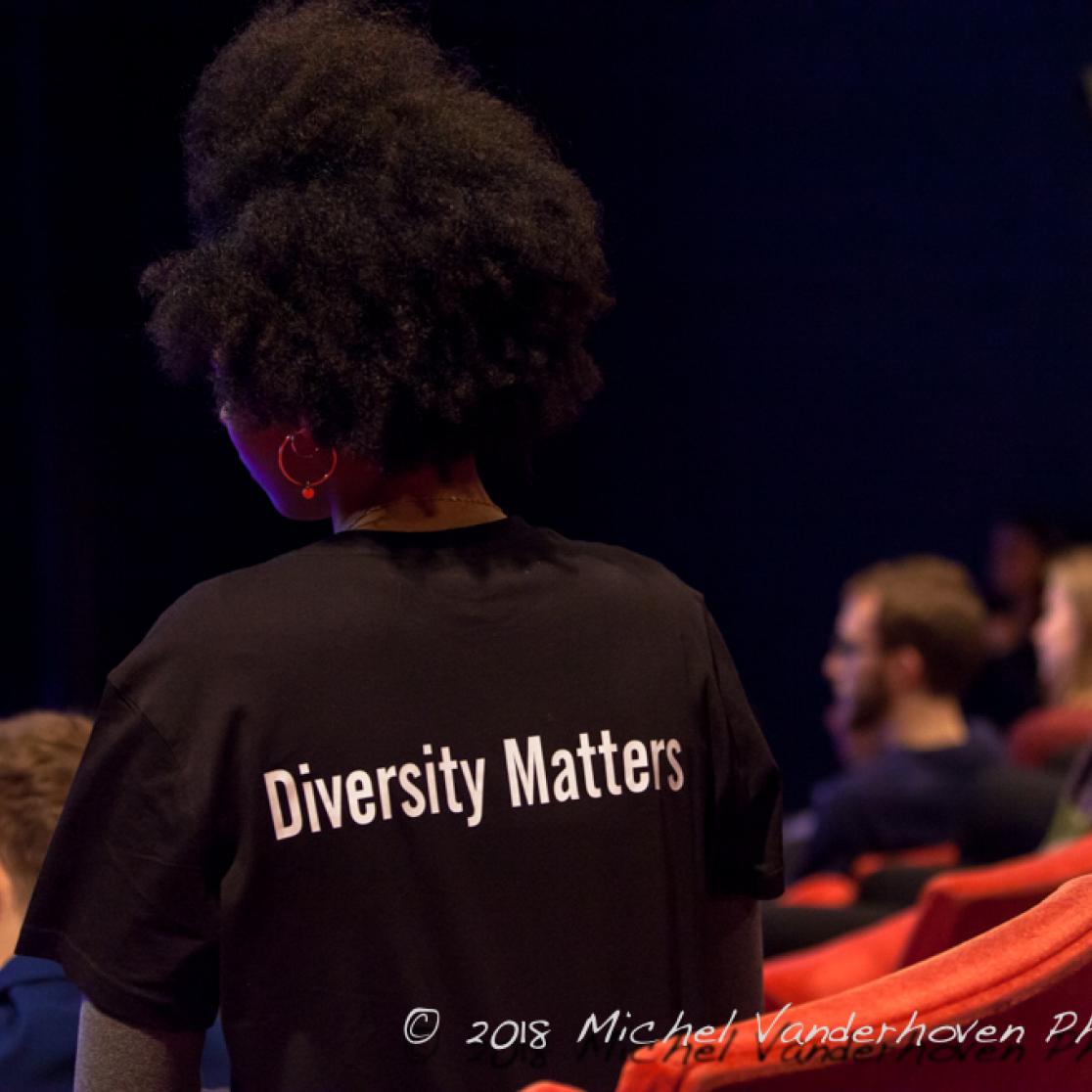 The back of a person with the T-shirt stating 'Diversity matters'