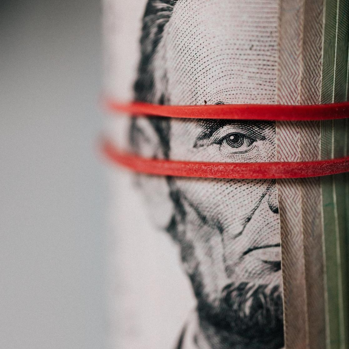 Source: Roll of American dollar banknotes tightened with band · Free Stock Photo (pexels.com)