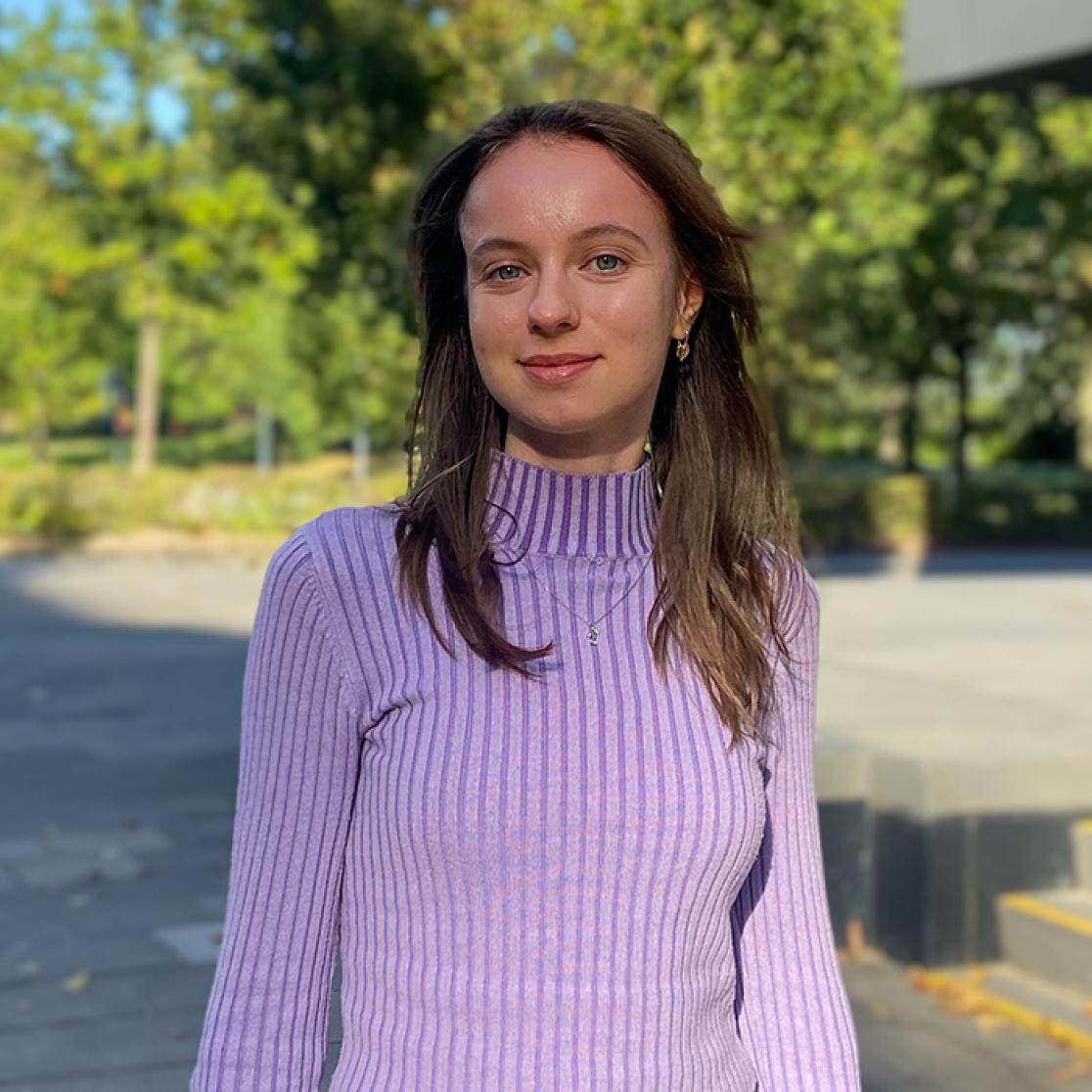 Student ambassador in front of FSE building