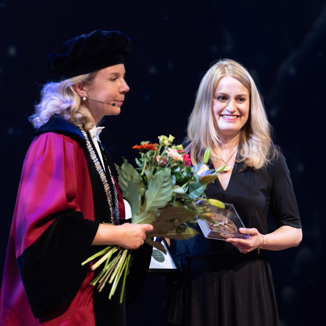 Award granted with flowers