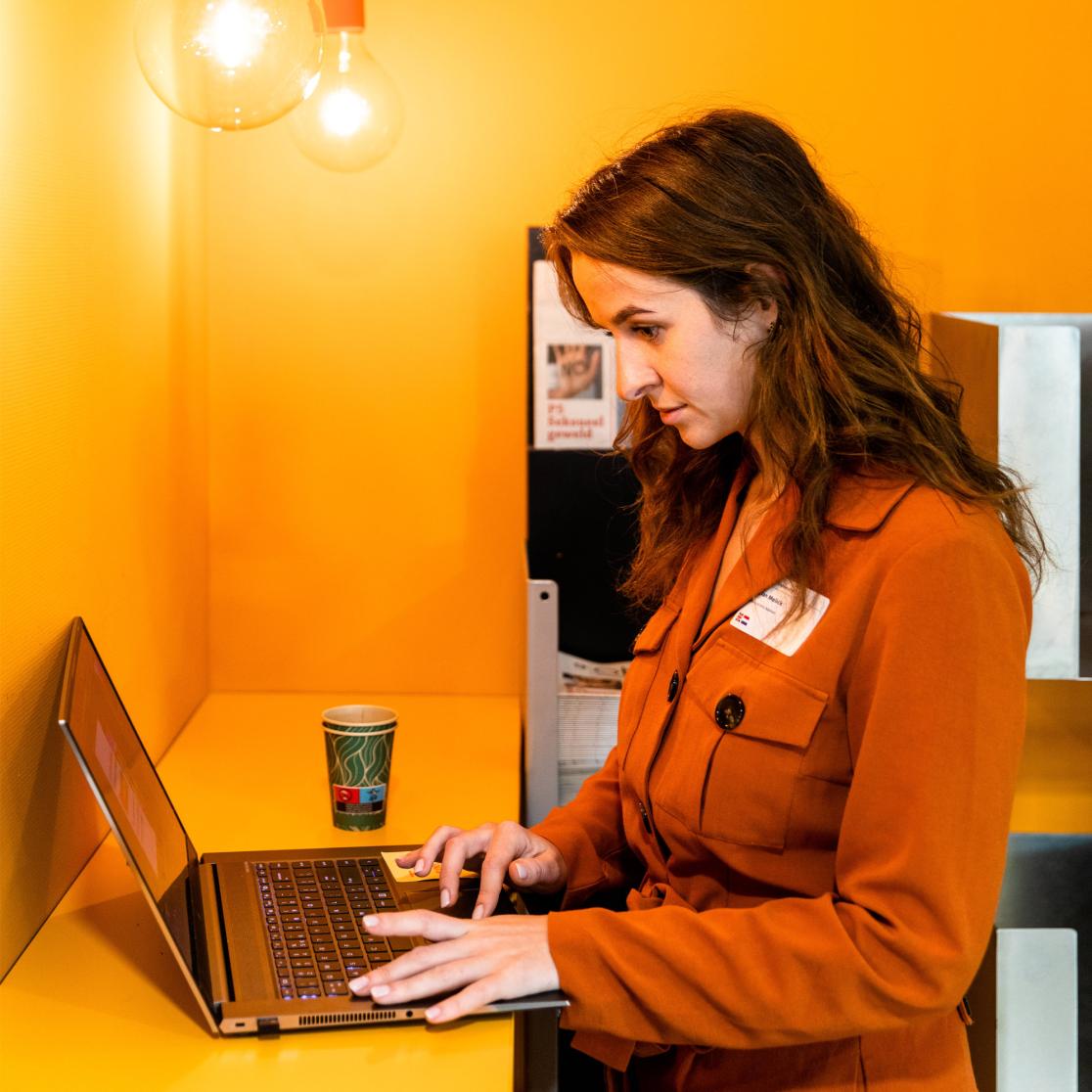 A student working on her laptop