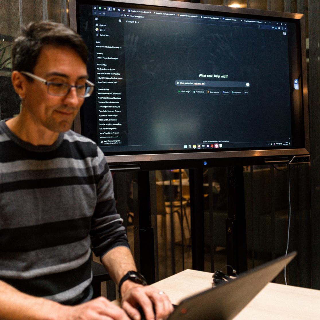 Michel Dumontier working on his laptop