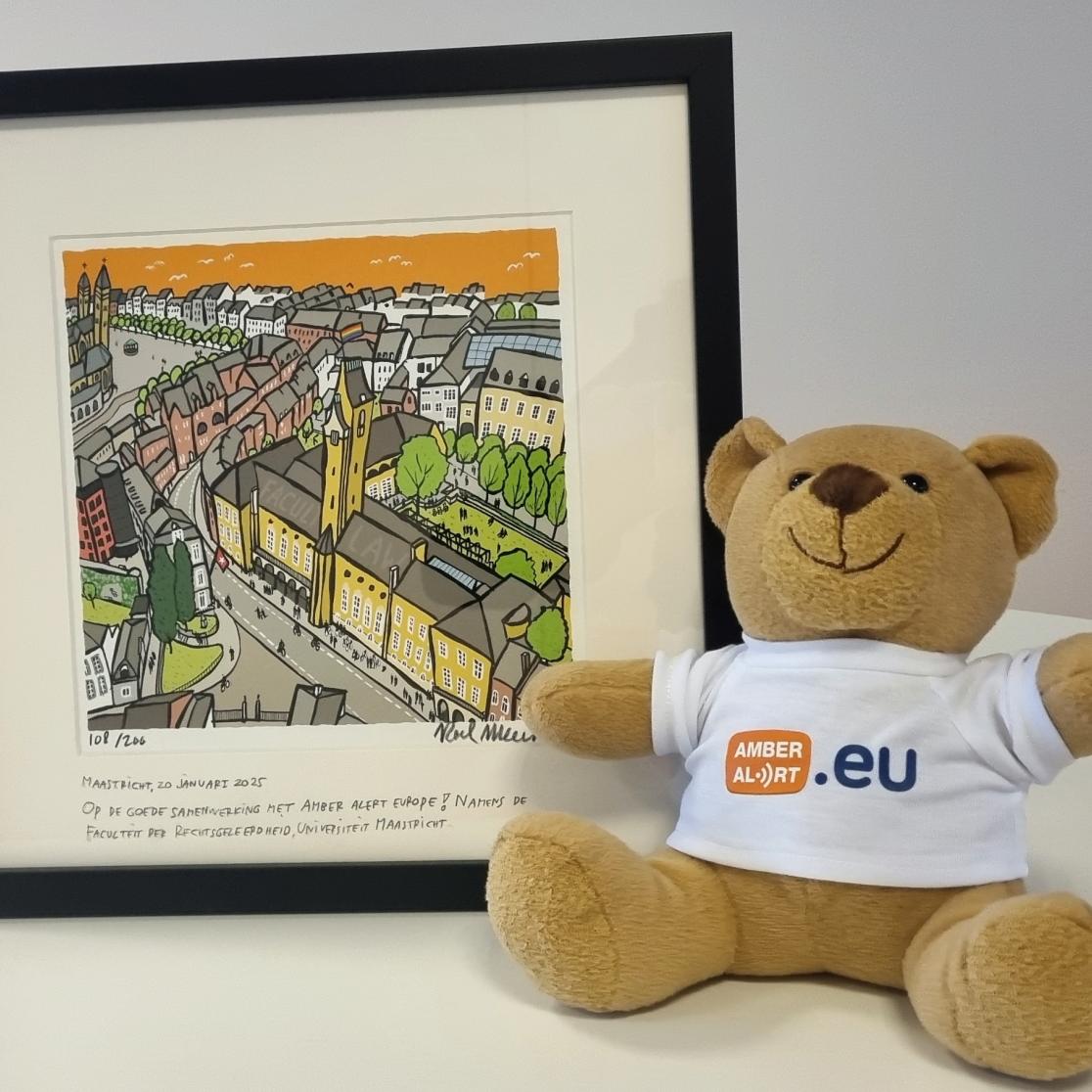A picture frame and teddy bear to symbolise the collaboration