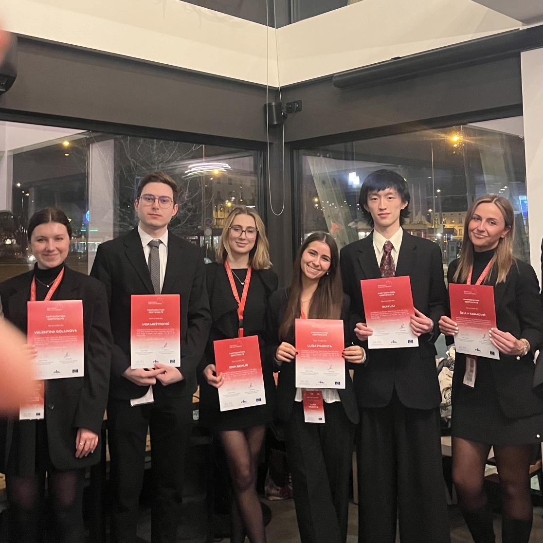 Our student team proudly showing their results in the Helga Pedersen Moot Court Competition