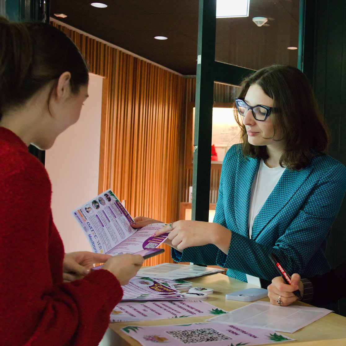 Students showing brochure