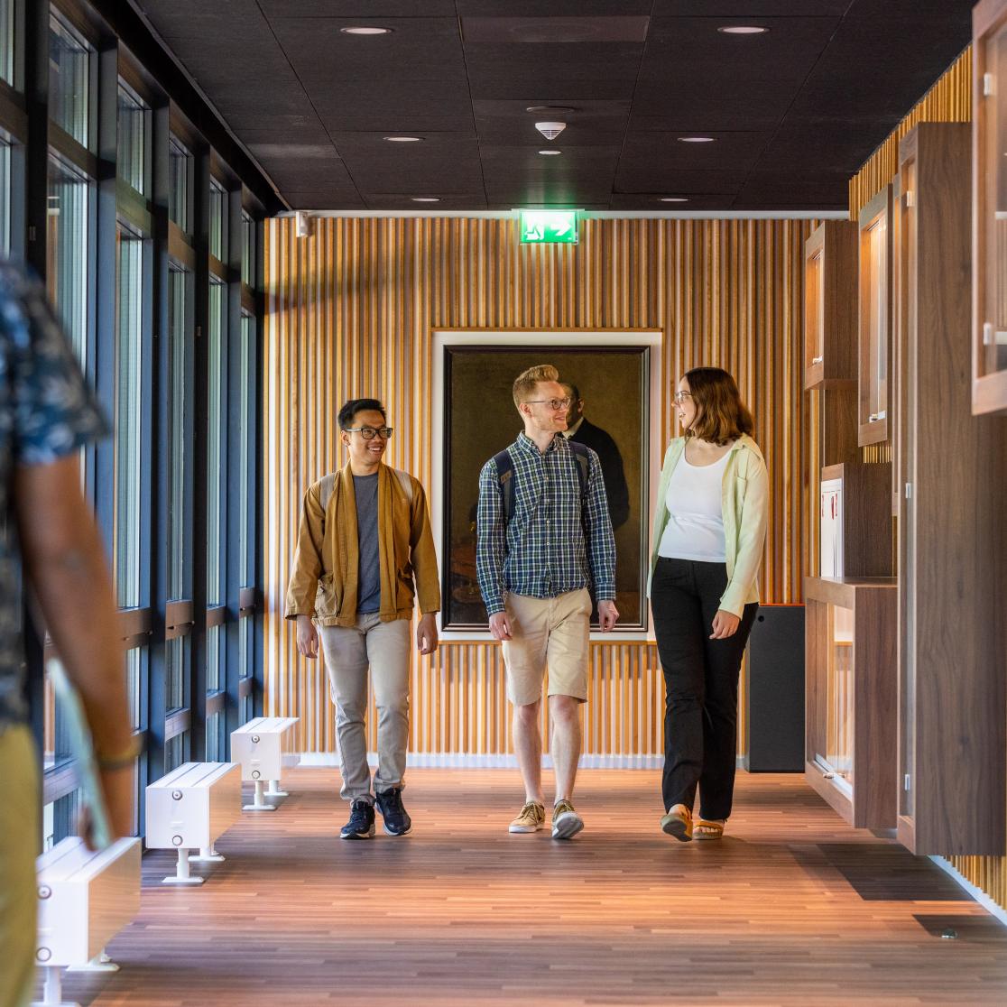 Students walking through hallway