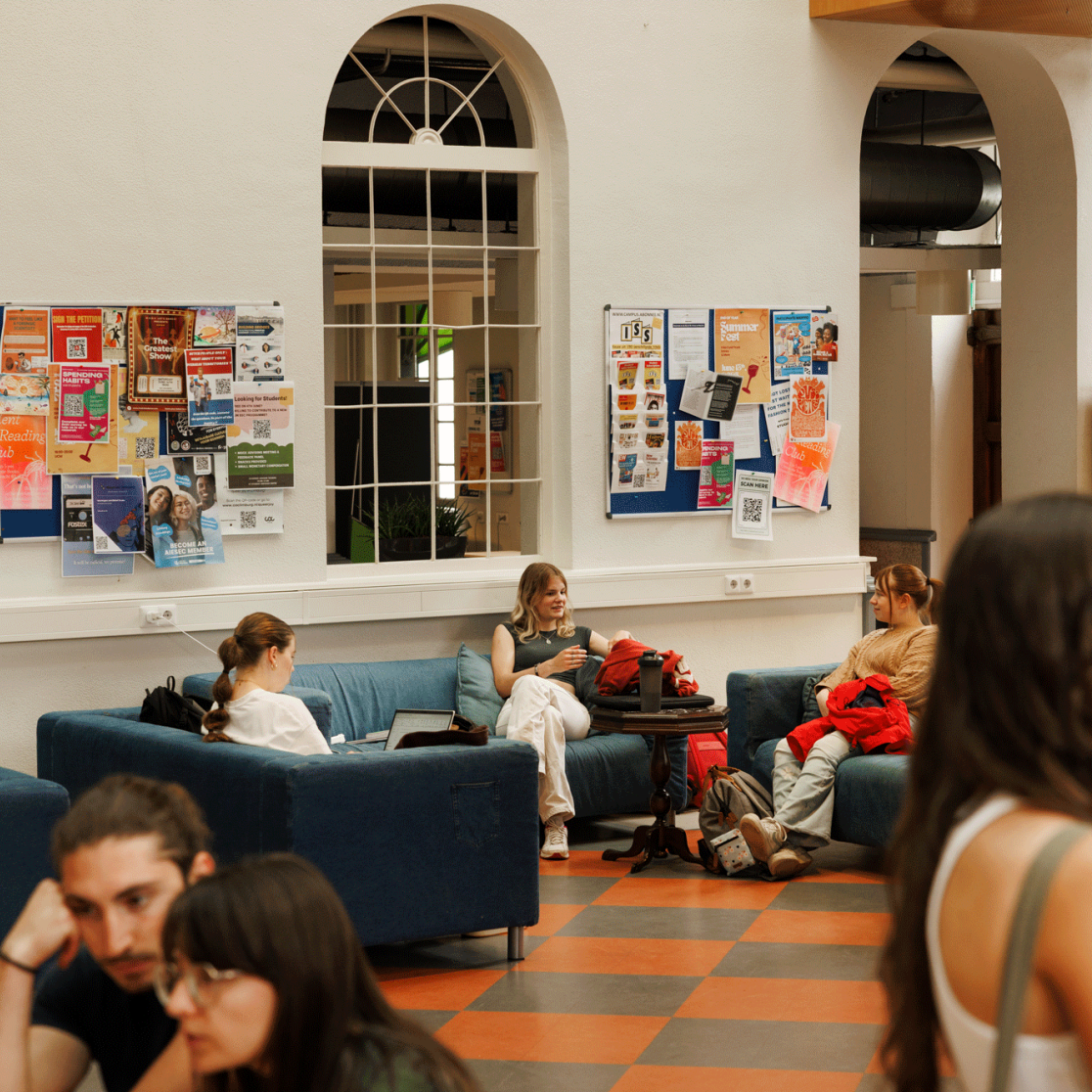 Students hanging out in the common room