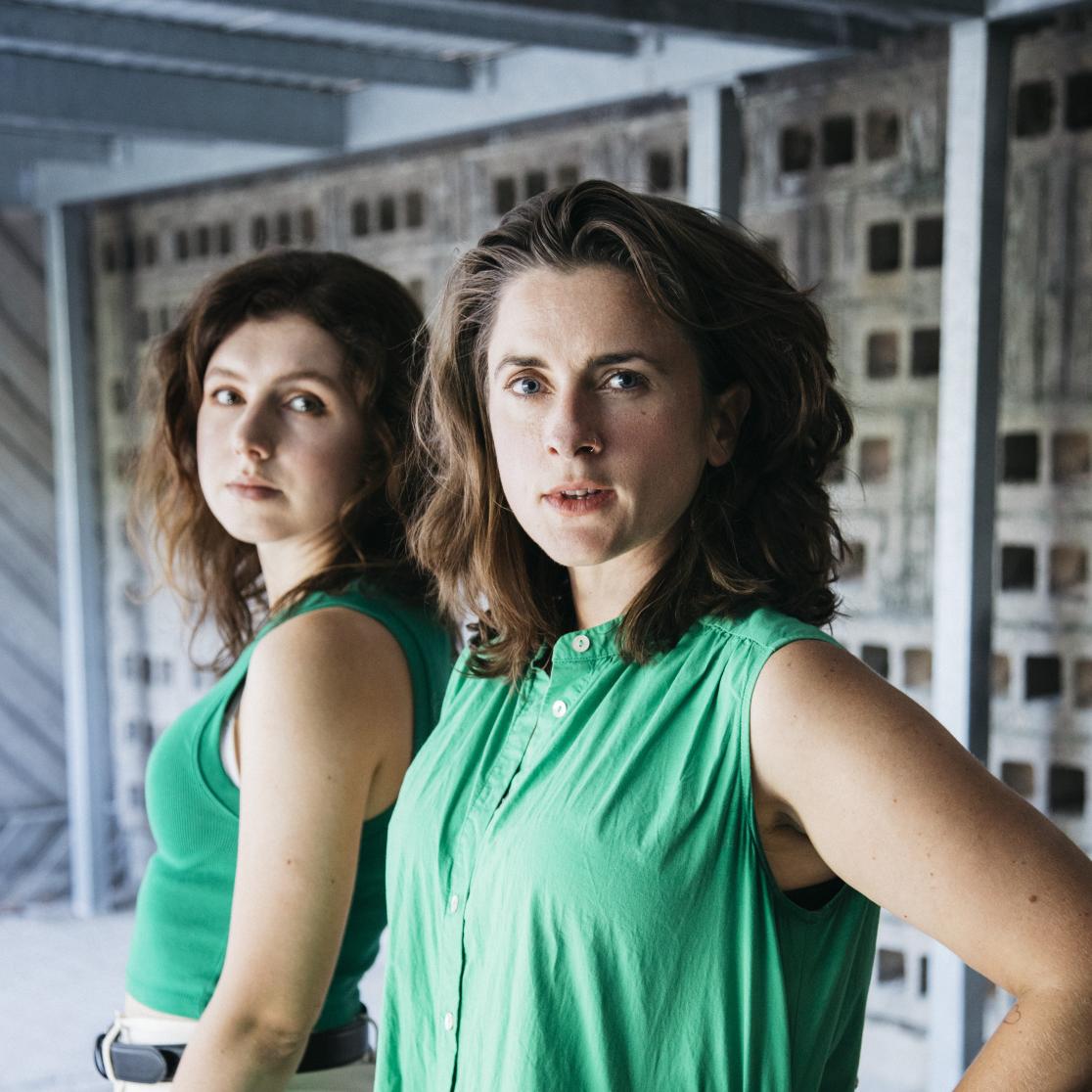 Dani and Valentina looking into camera