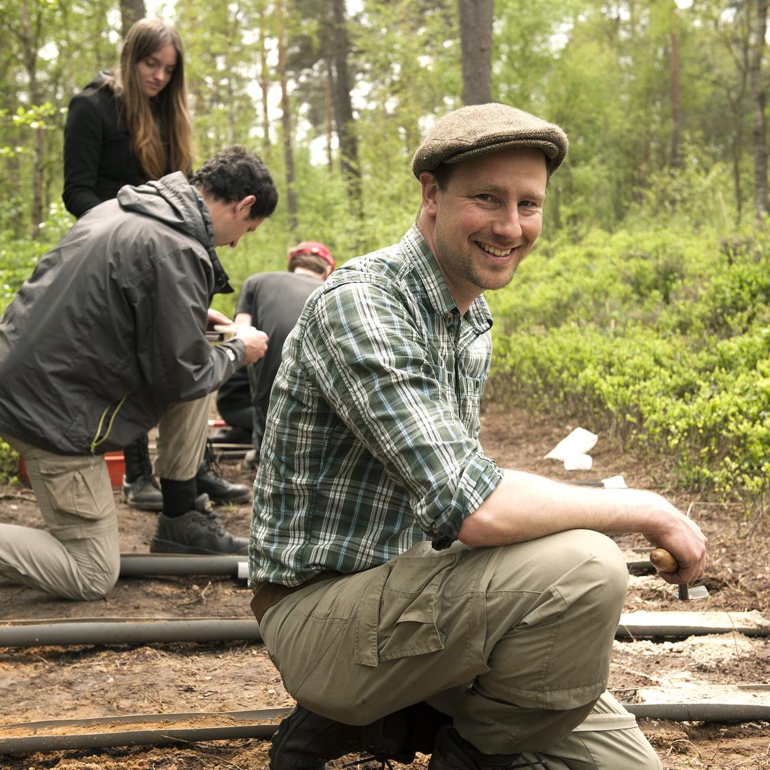 Lum Amkreutz working in the field 