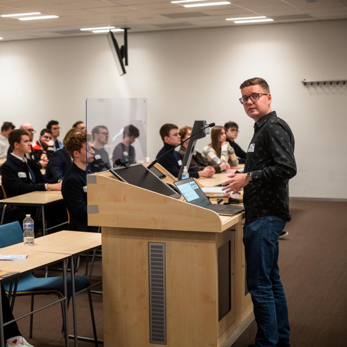 Man standing in front of class room