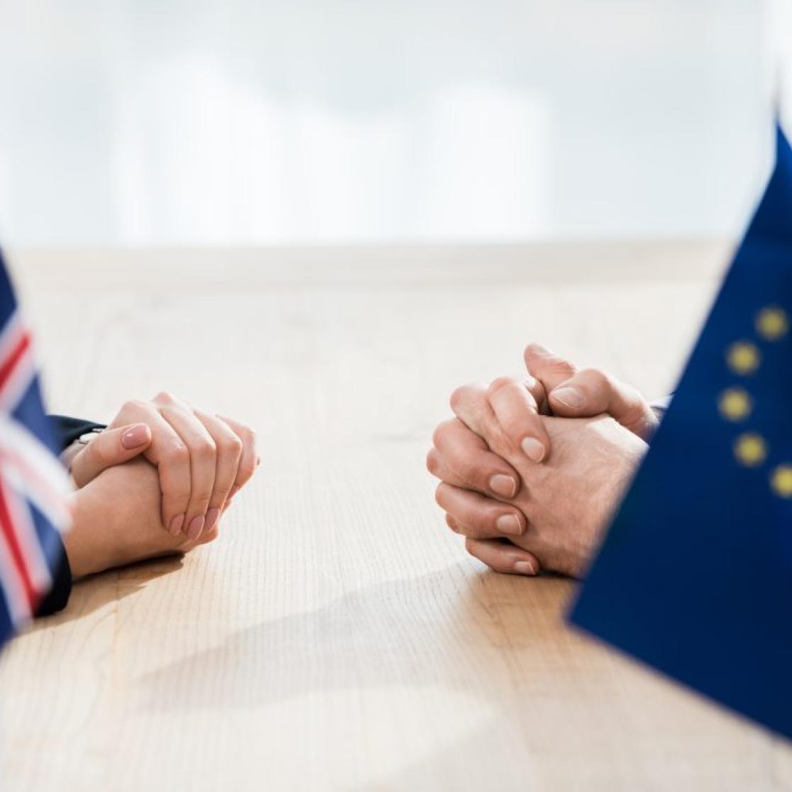 Brexit negotations featuring UK and EU flags
