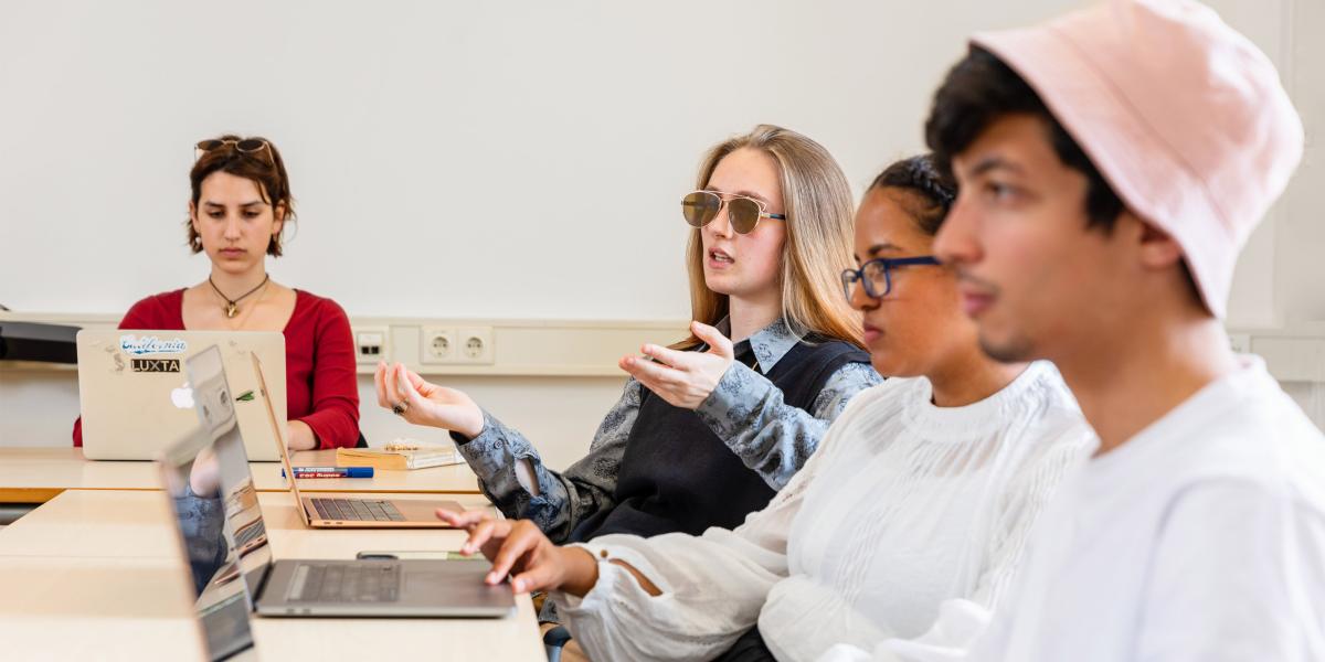 Students in a classroom engaged in a discussion