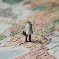 European Public Health: doctor doll stands on map of Europe