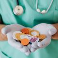 Healthcare Policy, Innovation and Management: chocolate coins in a doctor's hand