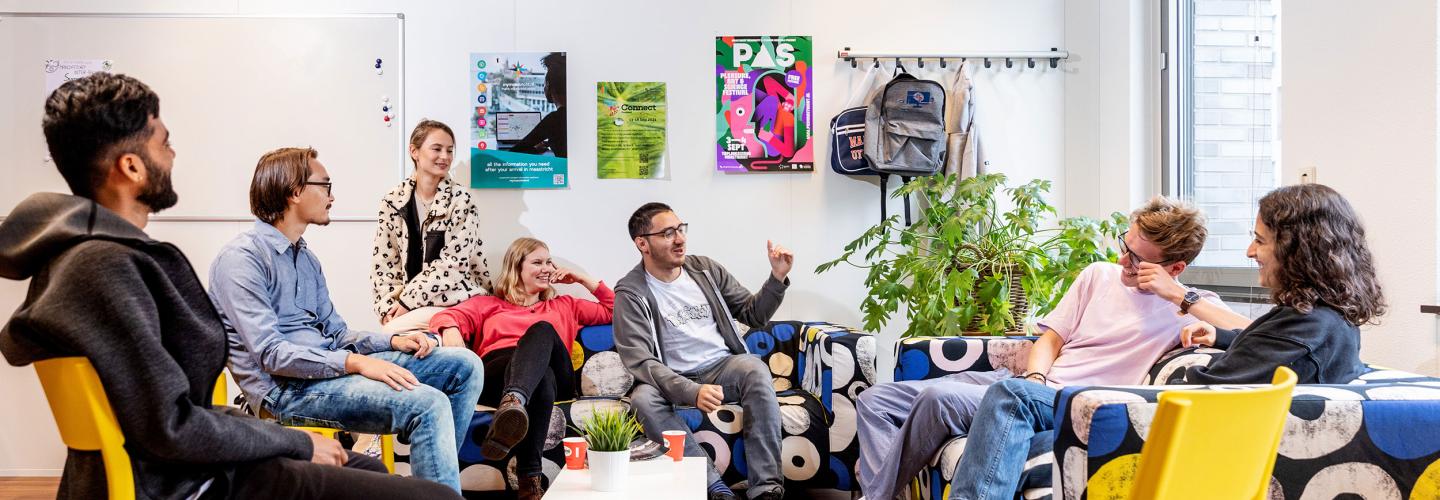 Group of students sitting in the common room