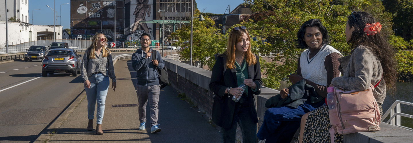 Students hanging out on in the city