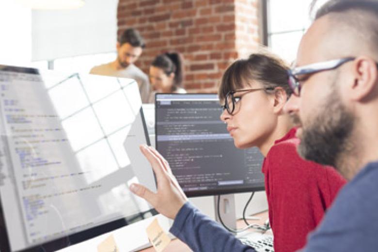 People collaborating on a coding or data science project