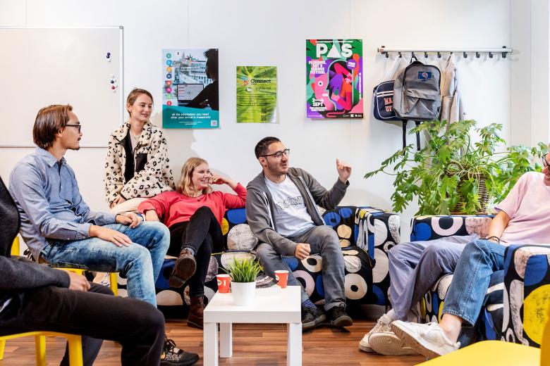 Group of students sitting in the common room