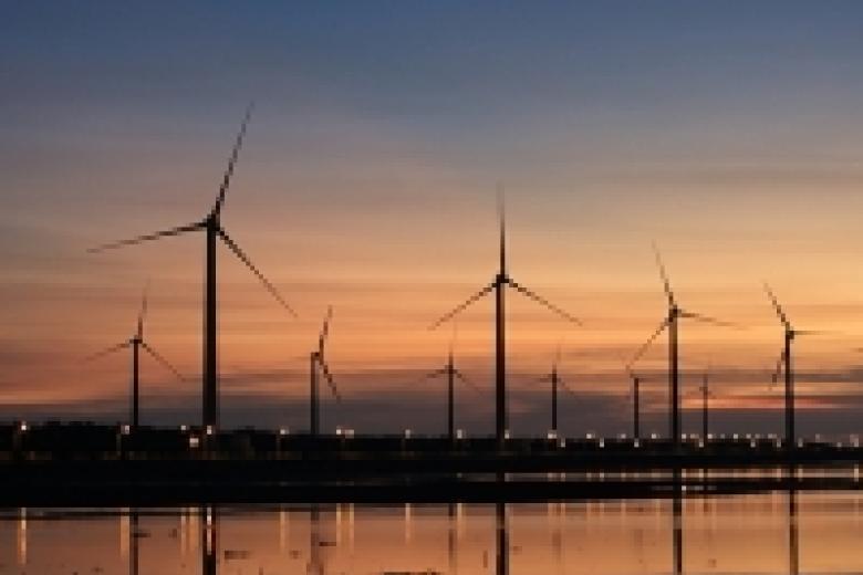 Windmills on the North Sea at sunset