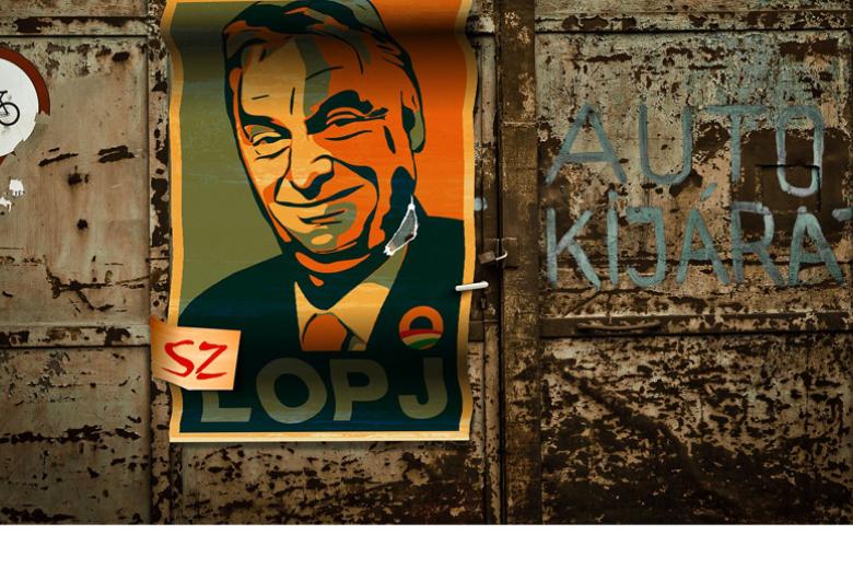 Wall with grafitti and Victor Orban poster
