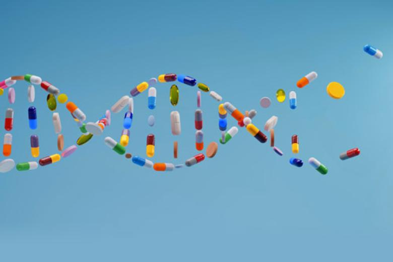 Pills layed out in the shape of a DNA spiral