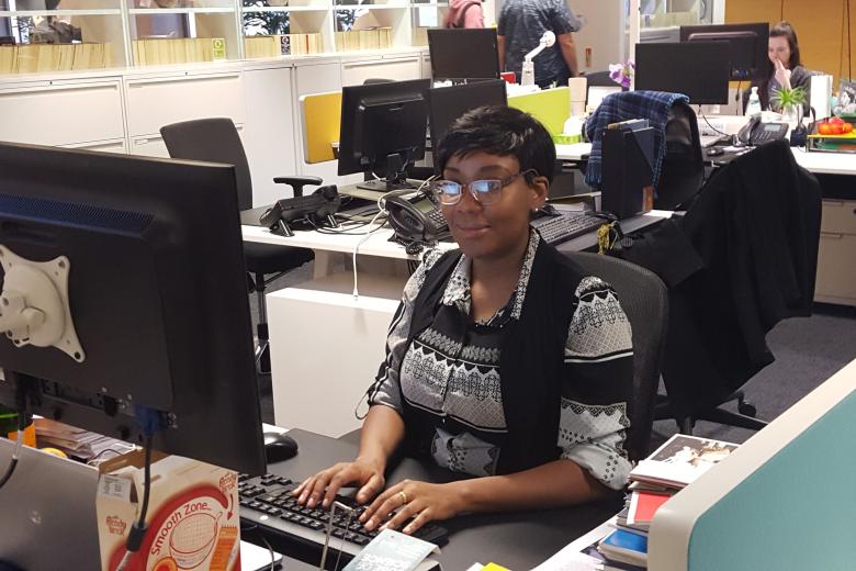 Behind the computer