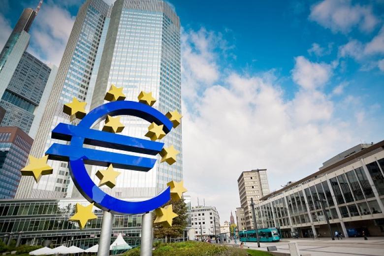 Euro logo in front of the EU Parliament Brussels