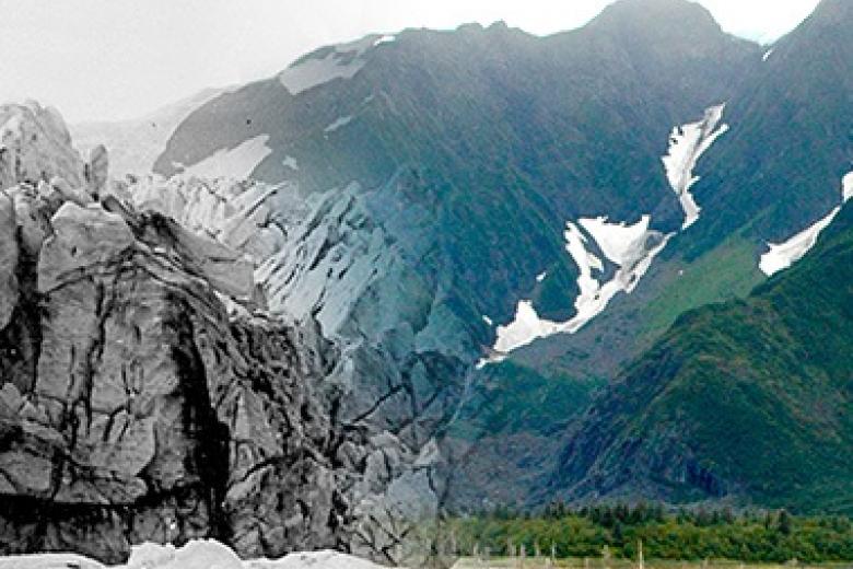 Landscape with mountains. Half colour, half black and white.