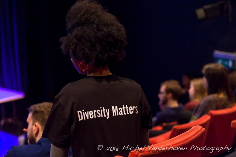 The back of a person with the T-shirt stating 'Diversity matters'